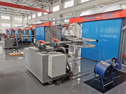 Automatyczna maszyna do formowania rotacyjnego w zakładzie produkcyjnym